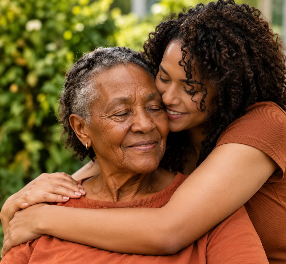 A mother and daughter embracing